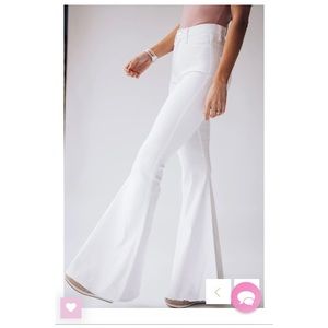 White bell bottom jeans, brand Vibrant M.i.u from Southern Alternative Boutique